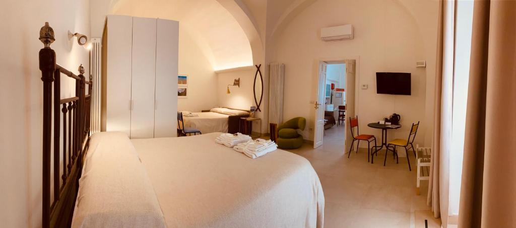 Postel nebo postele na pokoji v ubytování Ai Sottani B&B Deluxe Suite