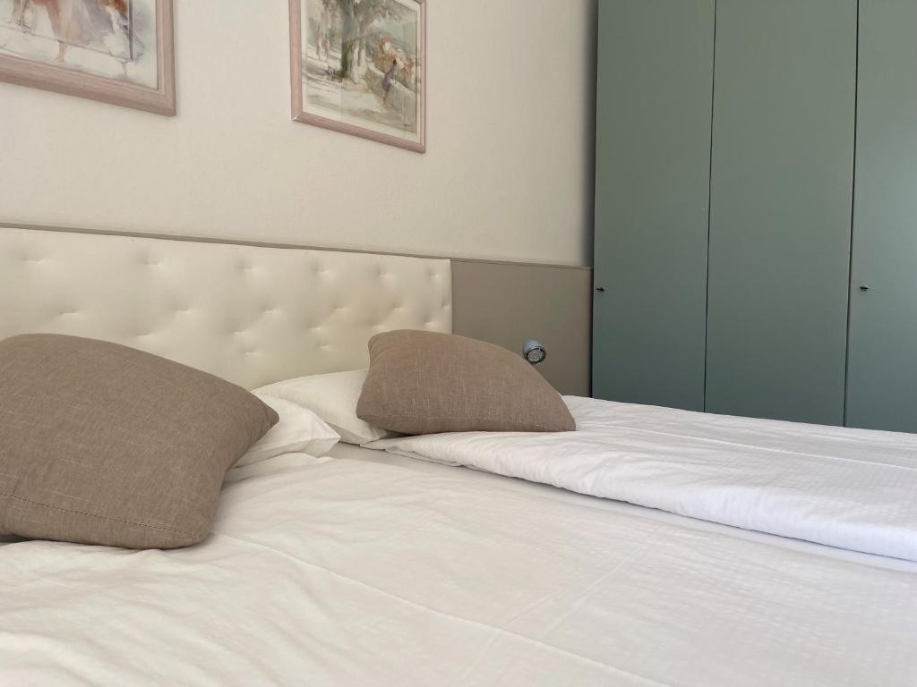 Postel nebo postele na pokoji v ubytování Hotel Garden Arco