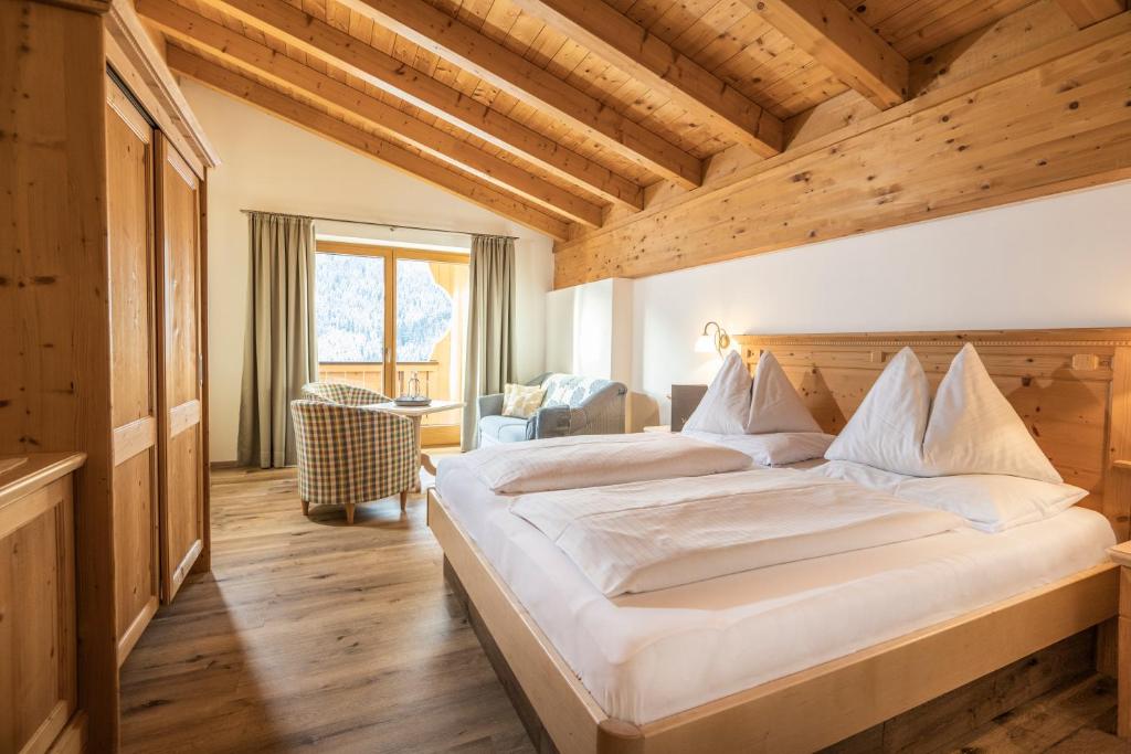 Rúm í herbergi á Hotel Vorderronach