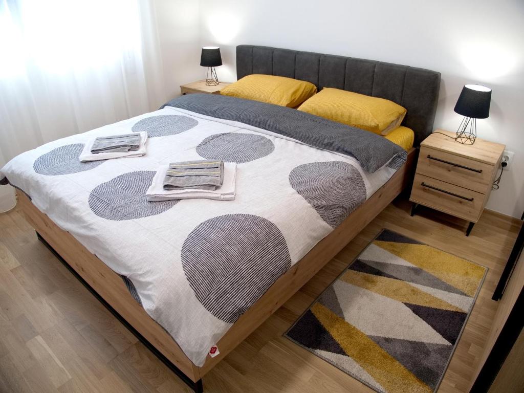 Postel nebo postele na pokoji v ubytování Adriatic Apartment