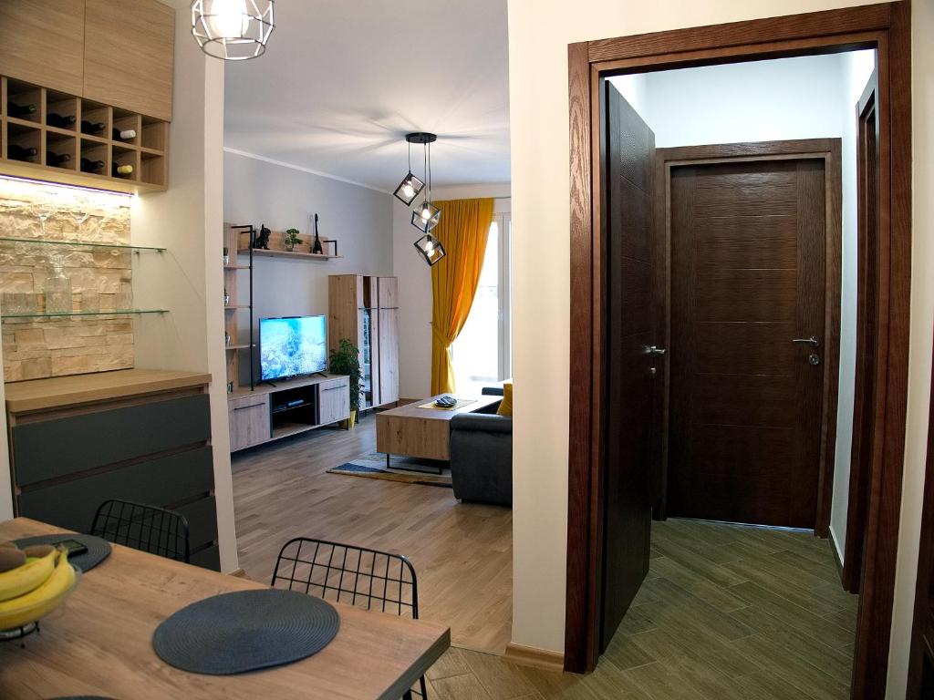 TV a/nebo společenská místnost v ubytování Adriatic Apartment
