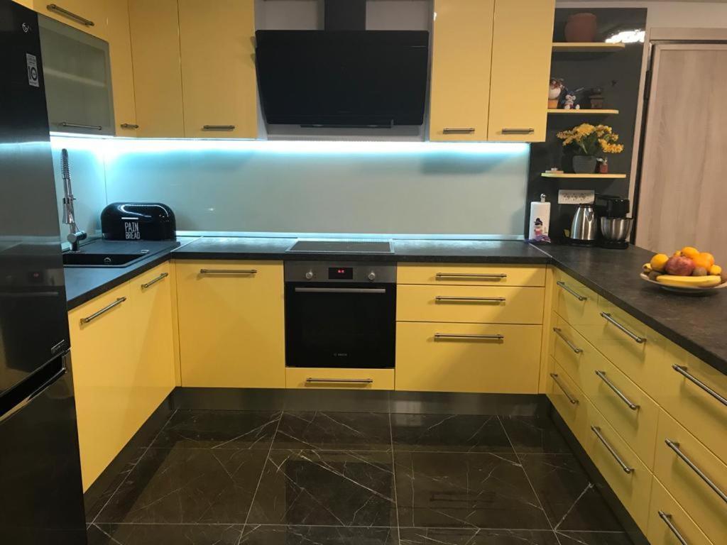 Kuchyň nebo kuchyňský kout v ubytování Apartmani Jukic