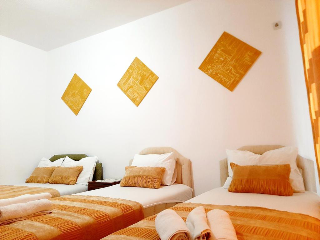Postel nebo postele na pokoji v ubytování Villa Alba Apartments