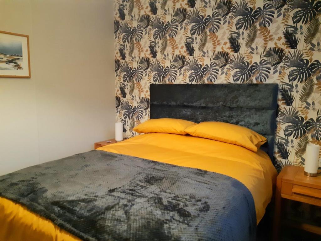 Postel nebo postele na pokoji v ubytování Sycamore Lodge Auchterarder