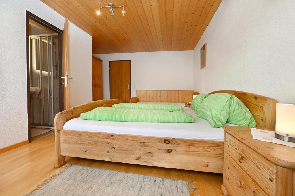 A bed or beds in a room at Haus Valuga