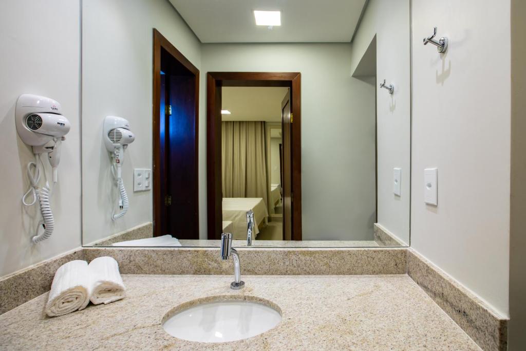 Koupelna v ubytování Hotel Encantos de Itaperapuã