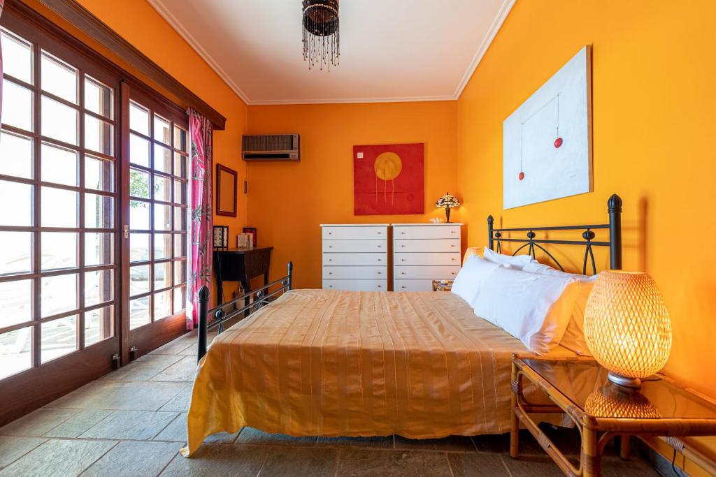 Postel nebo postele na pokoji v ubytování Villa Melandrina