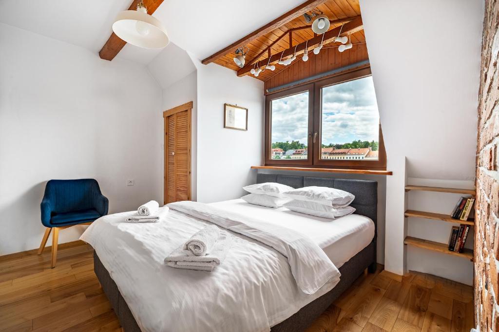 Katil atau katil-katil dalam bilik di Blick Apartments - Riverview Studio Apartment