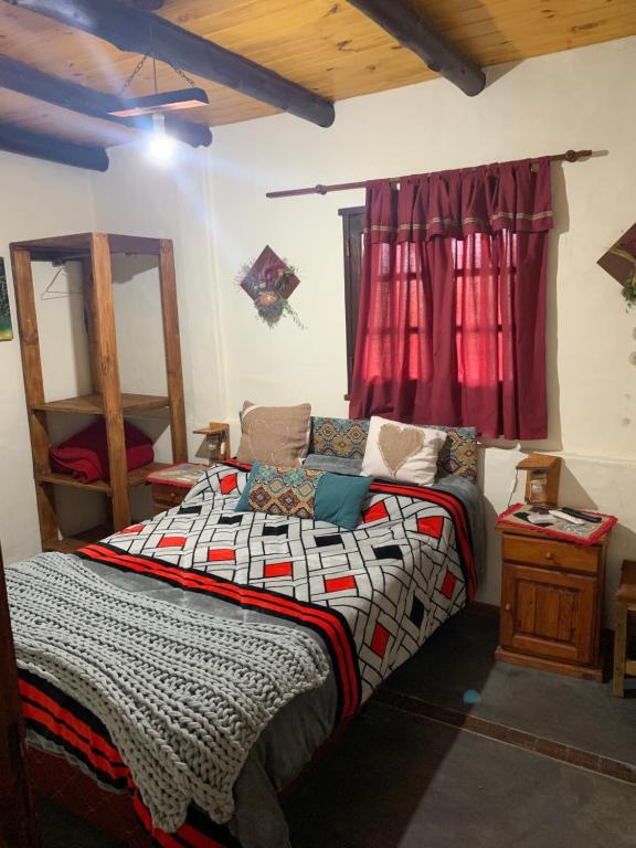 Postel nebo postele na pokoji v ubytování HOSTAL ISABELLA