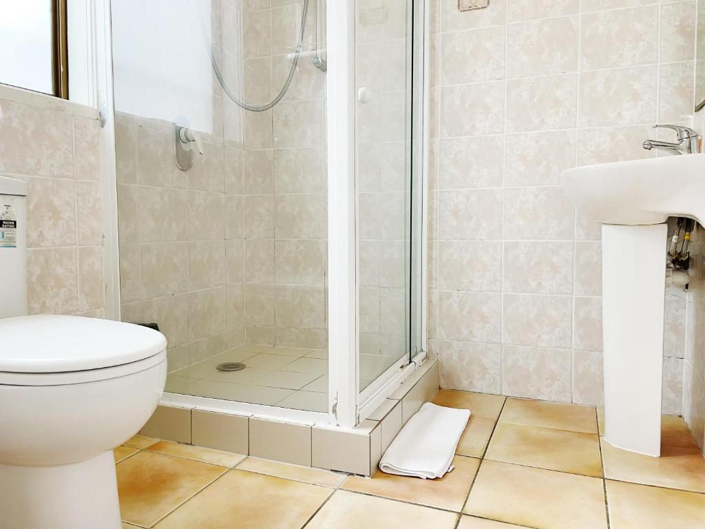Koupelna v ubytování Pupuke Manor Motel
