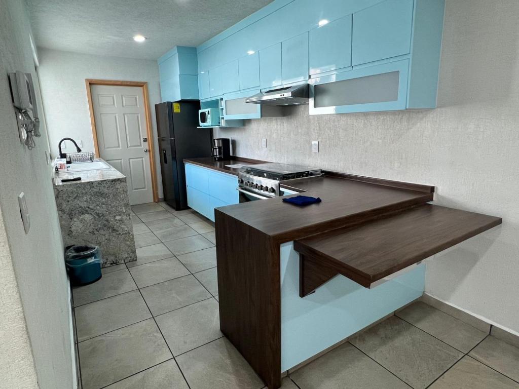 Kuchyň nebo kuchyňský kout v ubytování CASA EL CHALET