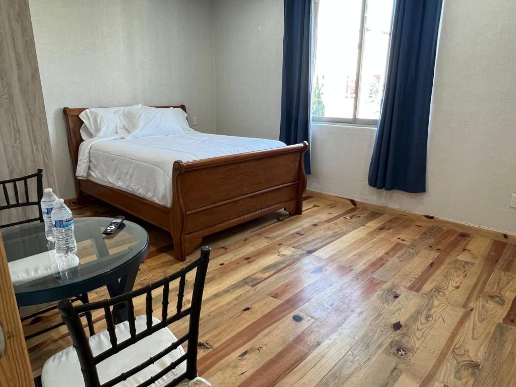 Postel nebo postele na pokoji v ubytování CASA EL CHALET