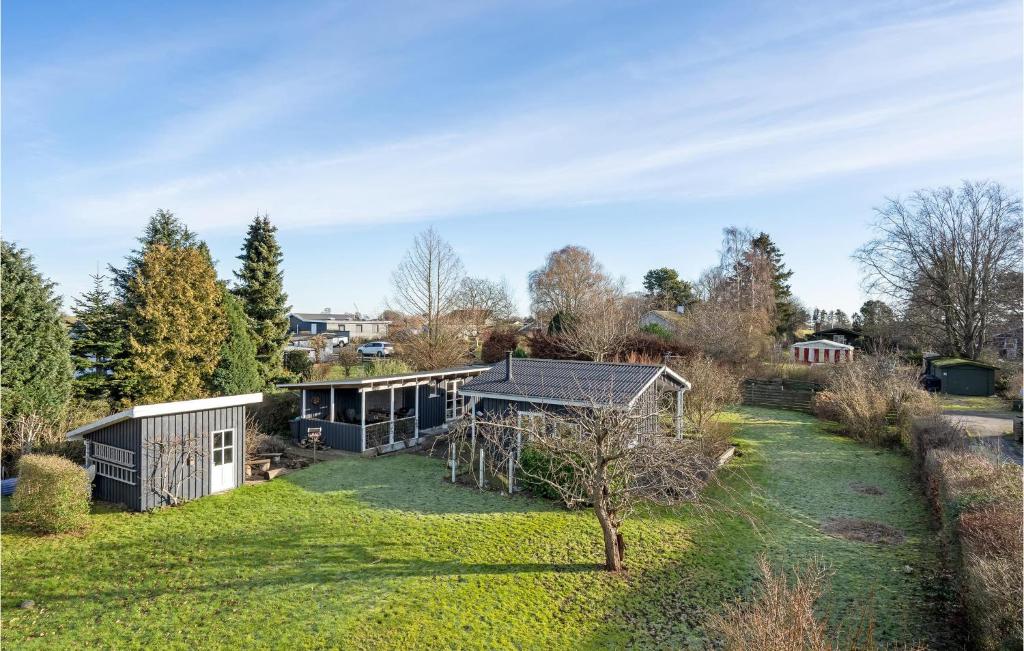 an aerial view of a garden with a house at Awesome Home In lsted With Wifi And 1 Bedrooms in Ølsted