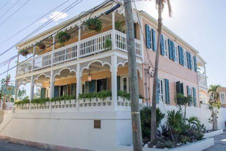 a large building with a balcony on a street at The Fred - Adults only Hotel in Frederiksted
