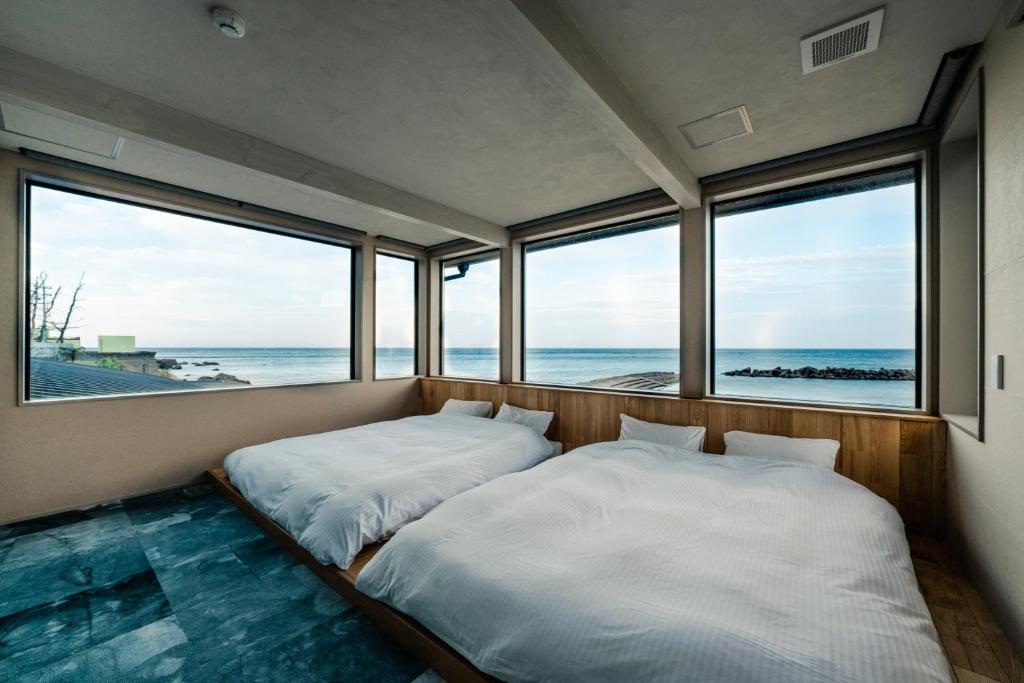 Postel nebo postele na pokoji v ubytování UMITOMA OCEANVIEW RESORT ECHIZEN