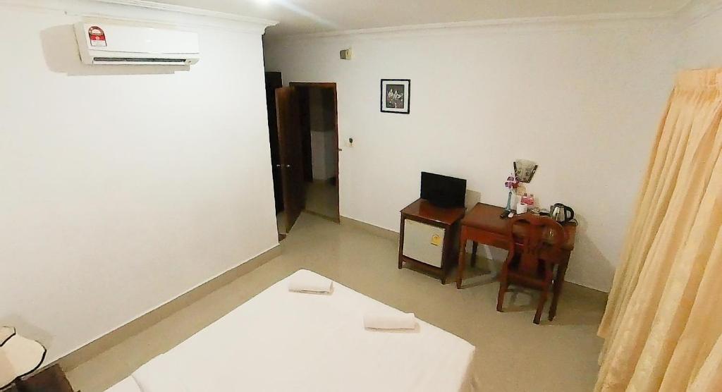 TV a/nebo společenská místnost v ubytování Riverside Hotel Phnom Penh