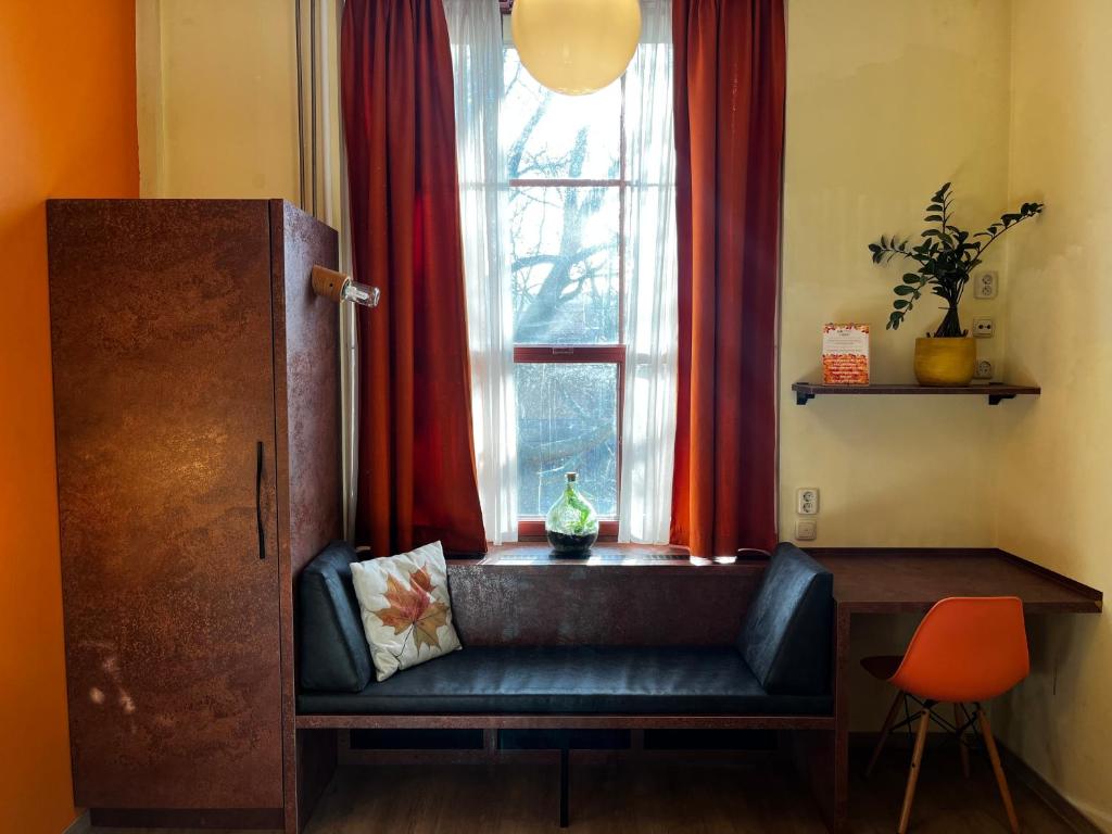 Posezení v ubytování Hotel de Plataan Delft Centrum