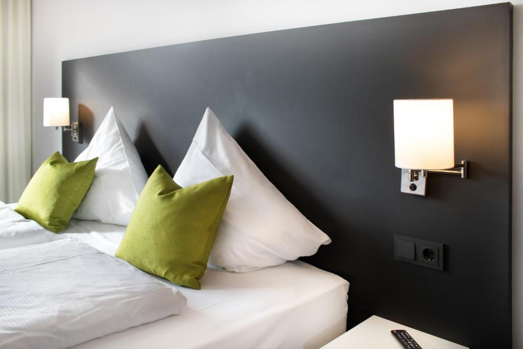 Postel nebo postele na pokoji v ubytování ING Hotel by WMM Hotels