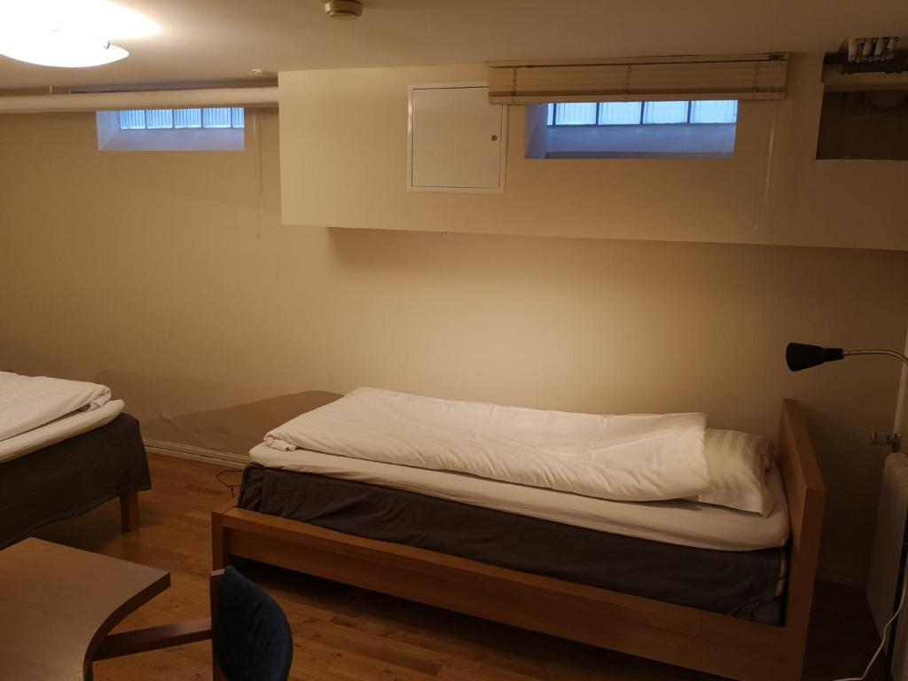 Postel nebo postele na pokoji v ubytování Wisby Trossen 4 AB