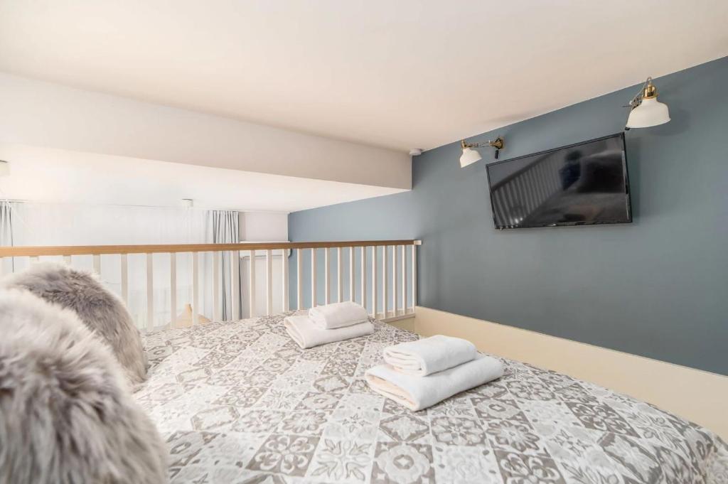 Posteľ alebo postele v izbe v ubytovaní Holiday Home Aparthotel 009 z balkonem przy plaży