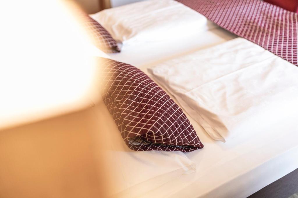 Postel nebo postele na pokoji v ubytování Hotel Der Heinrichshof