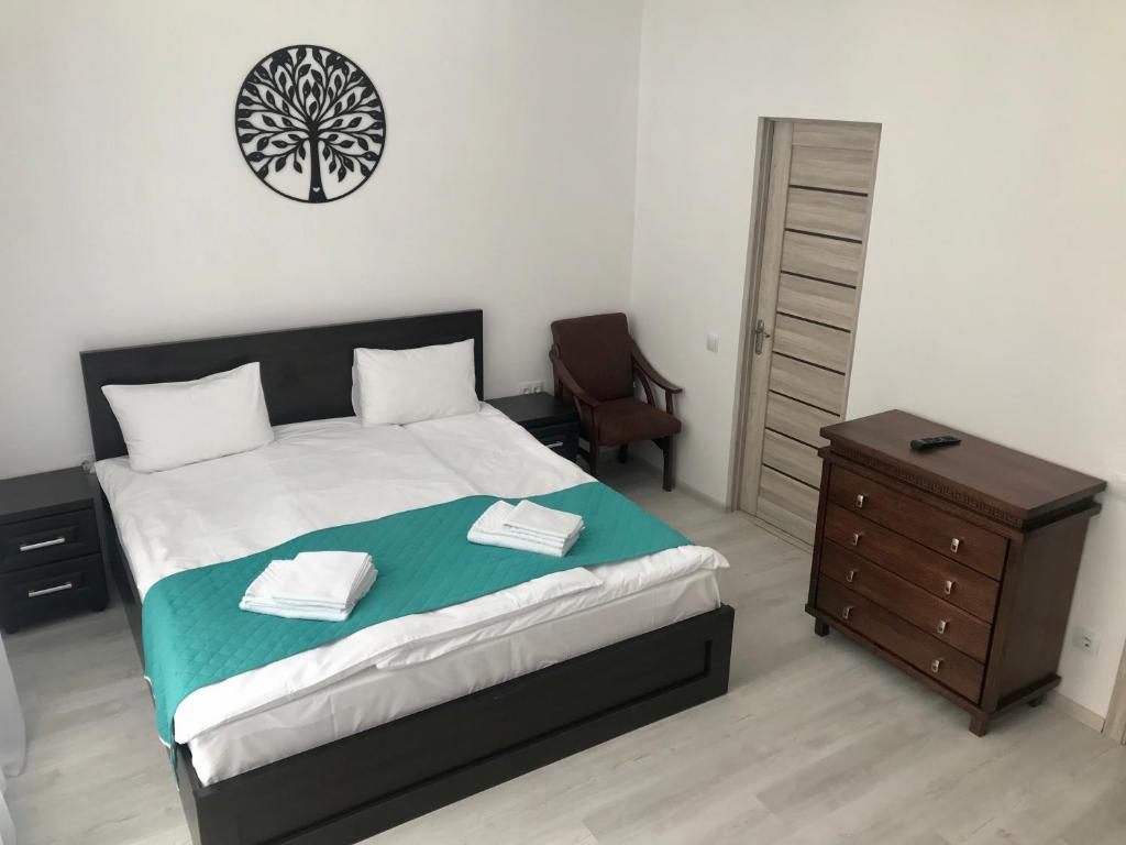 Postel nebo postele na pokoji v ubytování DACHA на Магурі