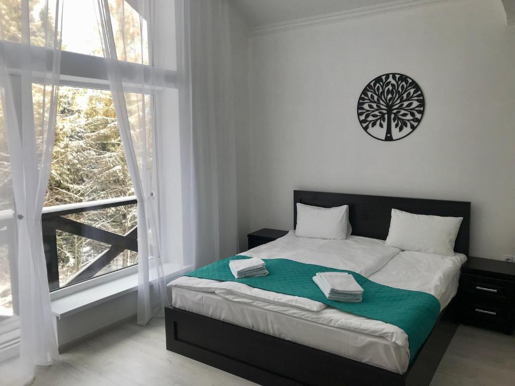 Postel nebo postele na pokoji v ubytování DACHA на Магурі