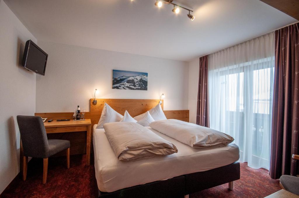 Postel nebo postele na pokoji v ubytování Frühstückspension Tannenhof