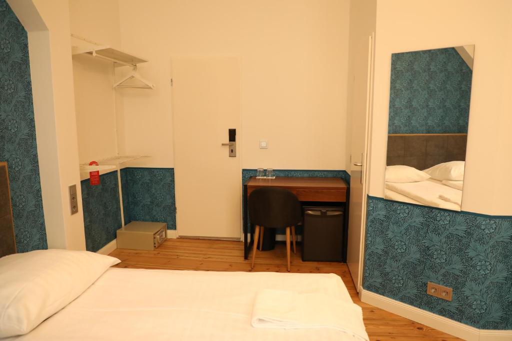 Postel nebo postele na pokoji v ubytování Art Hotel Charlottenburger Hof Berlin