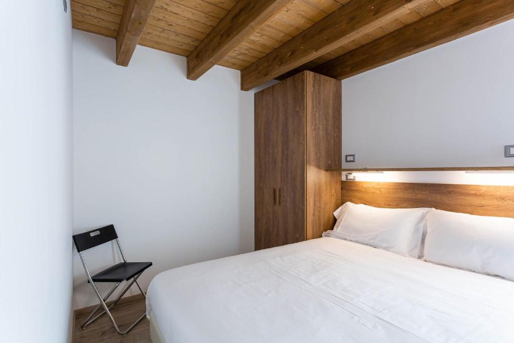 Postel nebo postele na pokoji v ubytování Residence Villa Brioschi