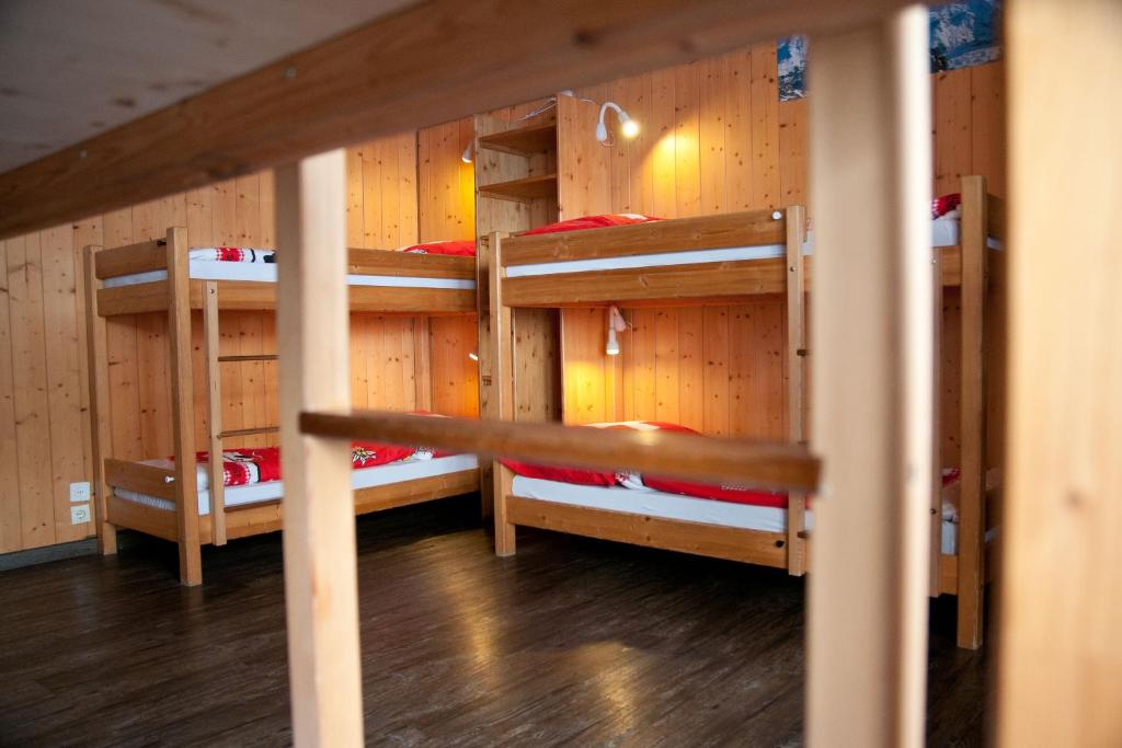 Postel nebo postele na pokoji v ubytování Valley Hostel