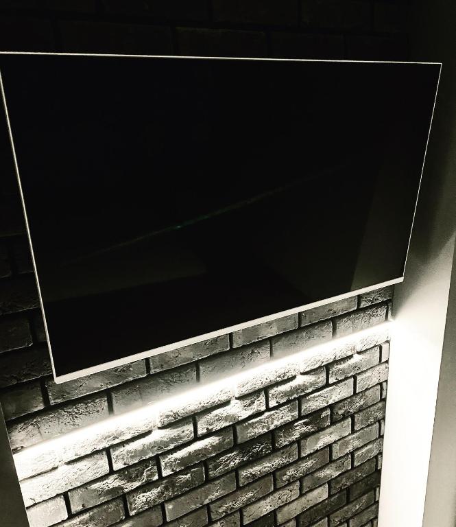 TV a/nebo společenská místnost v ubytování Trendy House 158