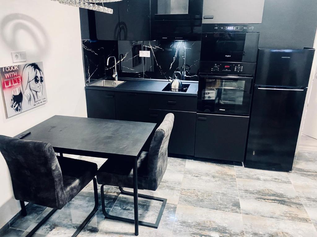 Kuchyň nebo kuchyňský kout v ubytování Trendy House 158