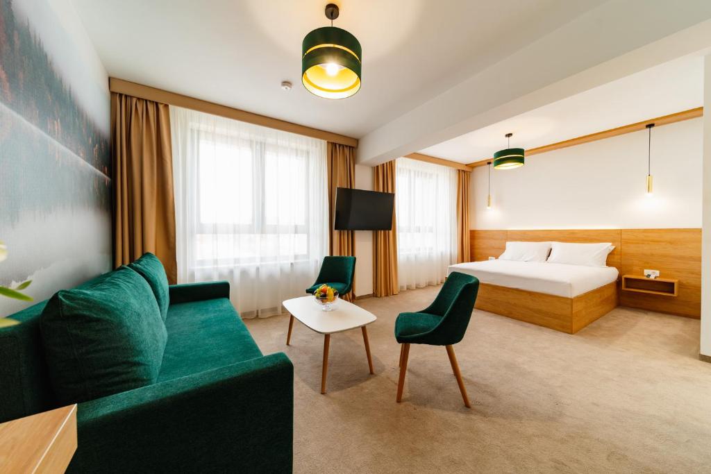 Postel nebo postele na pokoji v ubytování Hotel Küküllő - Târnava
