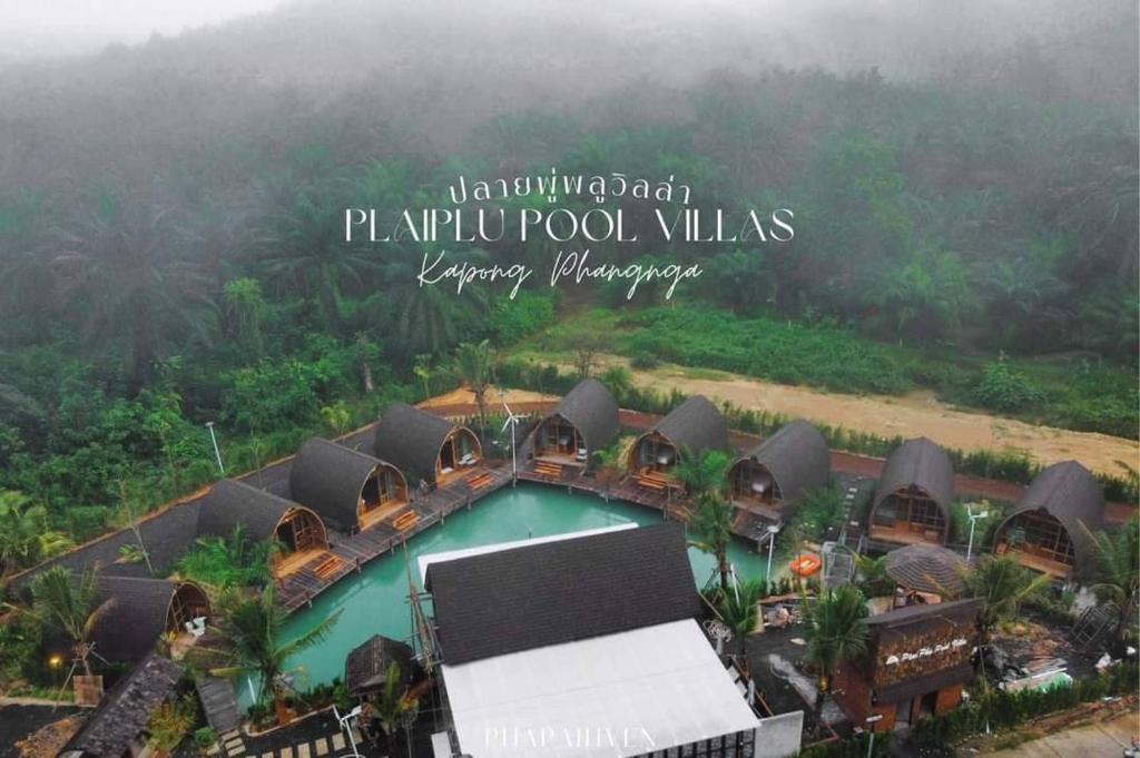 an aerial view of a resort with a swimming pool at Plaiphu Pool Villas in Phangnga
