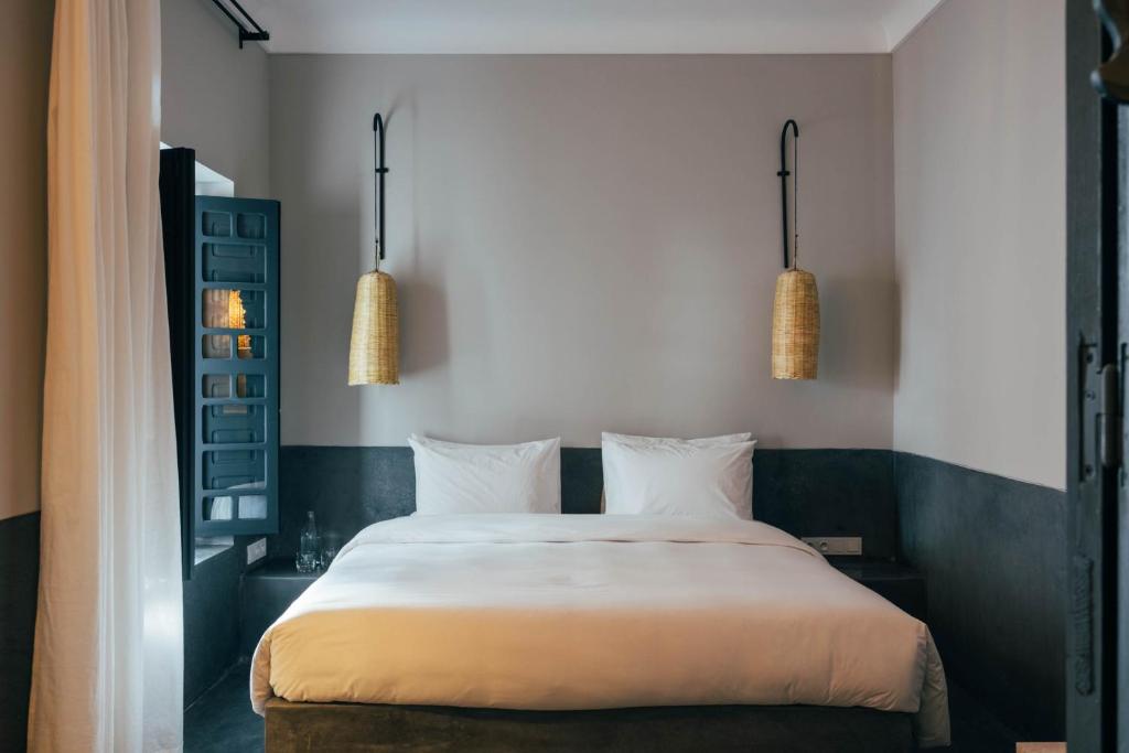 Uma cama ou camas num quarto em Riad no37