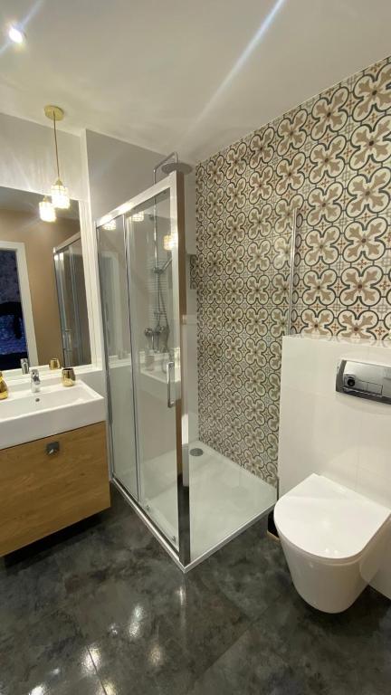 Kúpeľňa v ubytovaní Apartament Long Island Gdańsk