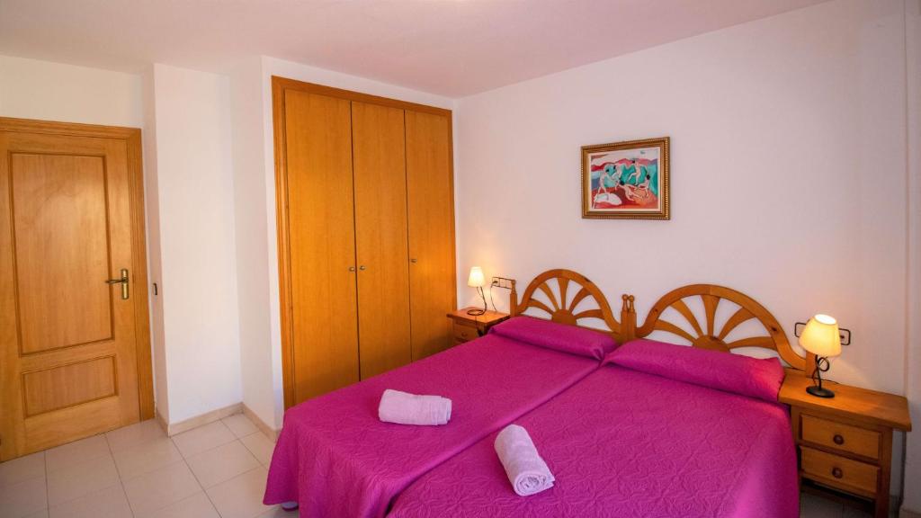 Postel nebo postele na pokoji v ubytování Primera línea Playa Cargador - Playamar 1121 - ALBERT VILLAS