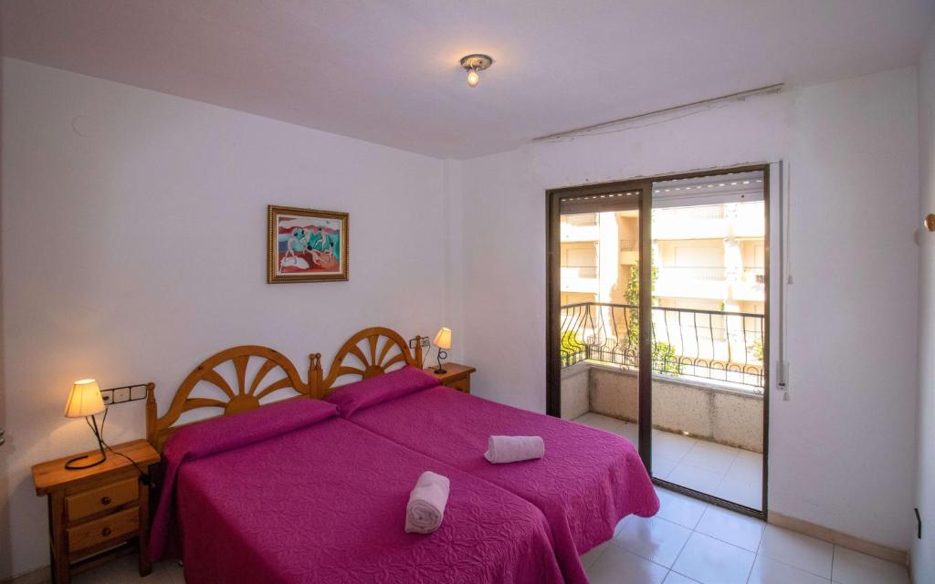 Postel nebo postele na pokoji v ubytování Primera línea Playa Cargador - Playamar 1121 - ALBERT VILLAS
