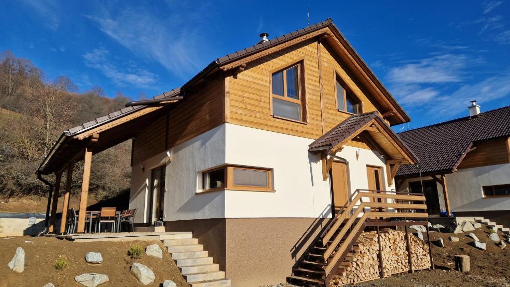 a house with a wooden roof at Mytho 1 in Mýto pod Ďumbierom