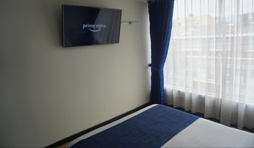 TV a/nebo společenská místnost v ubytování Hotel CGH Bogota Airport