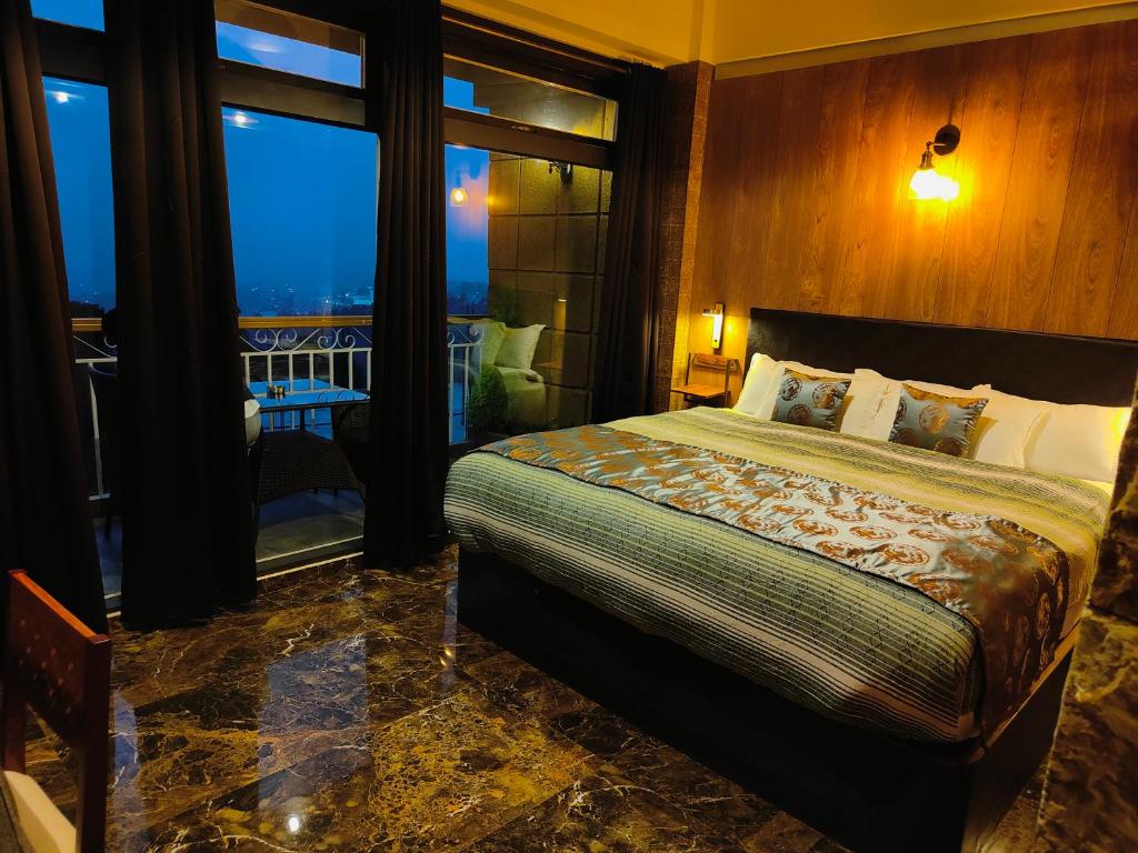 Katil atau katil-katil dalam bilik di Hotel Acropolis