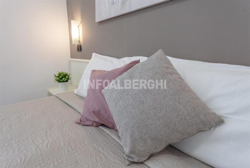 Postel nebo postele na pokoji v ubytování HOTEL CONTI