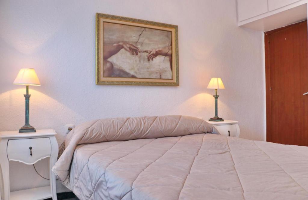 Posteľ alebo postele v izbe v ubytovaní Apartamento Plaza la Fuente