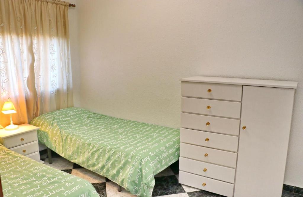Posteľ alebo postele v izbe v ubytovaní Apartamento Plaza la Fuente