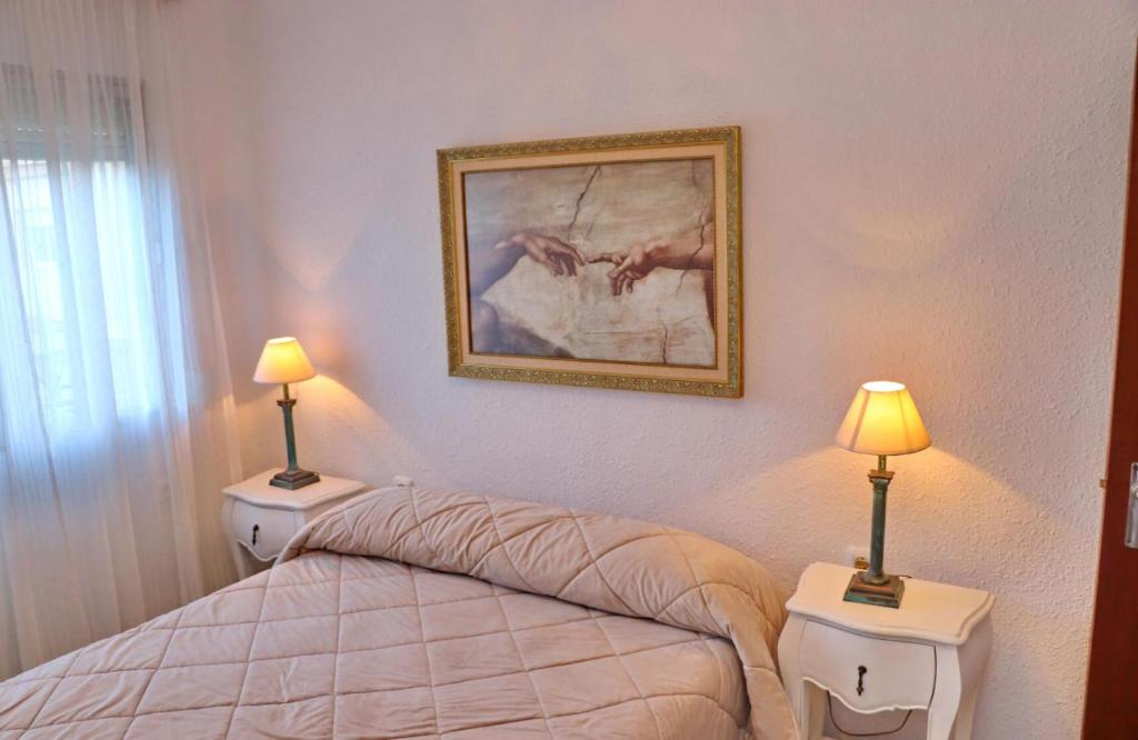 Posteľ alebo postele v izbe v ubytovaní Apartamento Plaza la Fuente