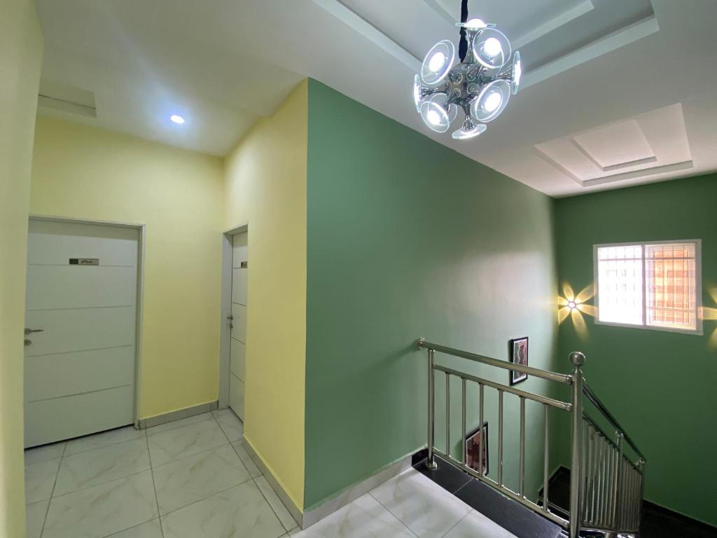 Postel nebo postele na pokoji v ubytování C7 Hazelwood Residence & Suites