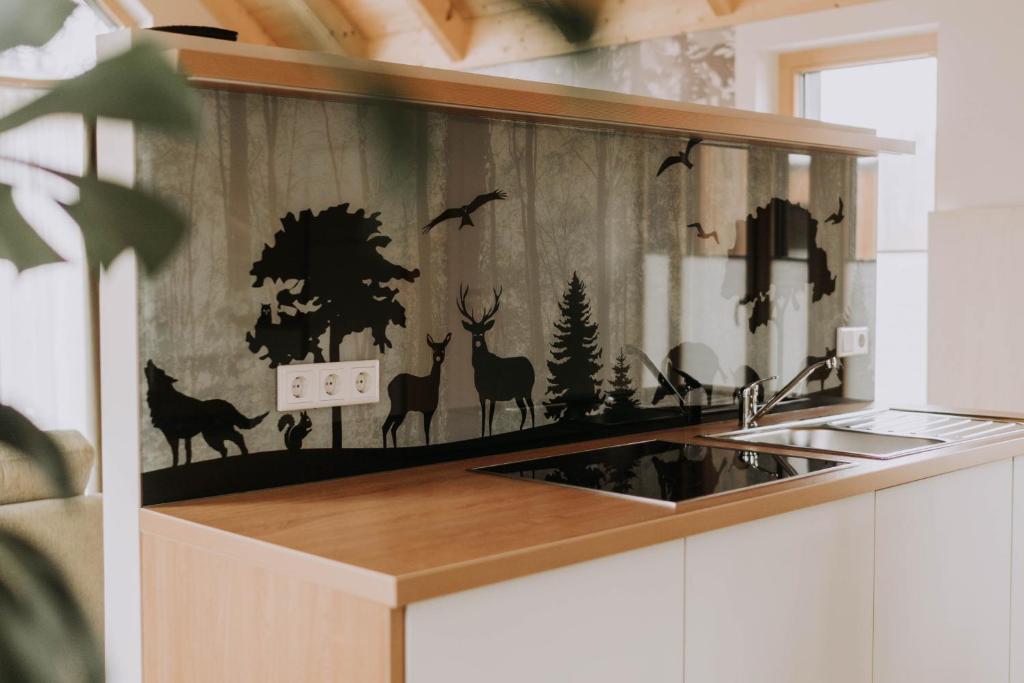 Kuchyň nebo kuchyňský kout v ubytování Waidlerland Waldkirchen Chalets