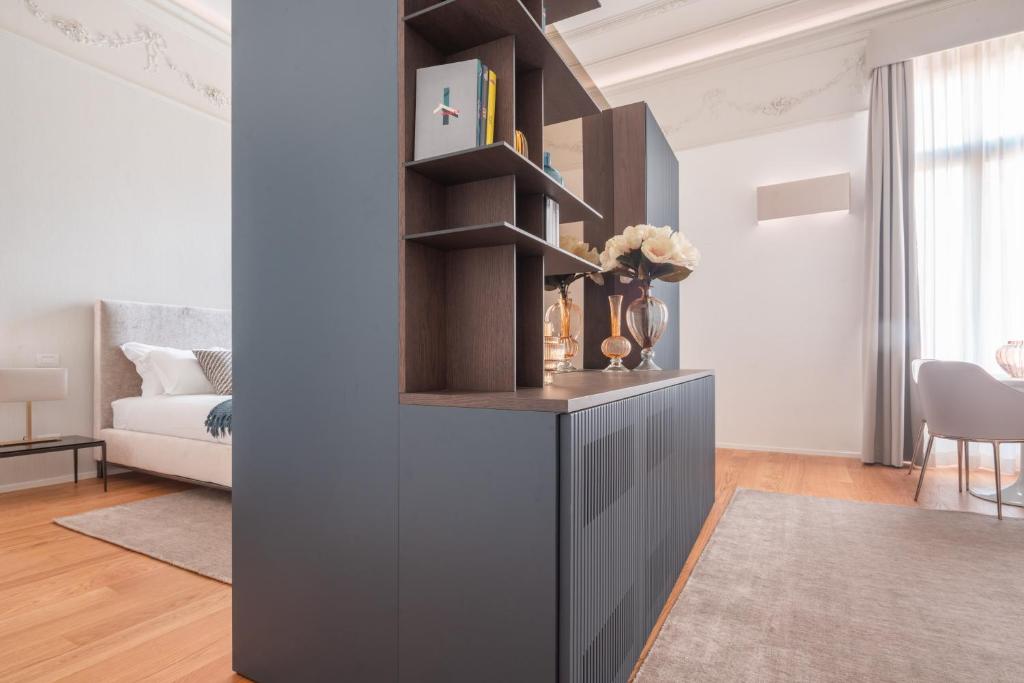 Postel nebo postele na pokoji v ubytování Ninfea Luxury Suites