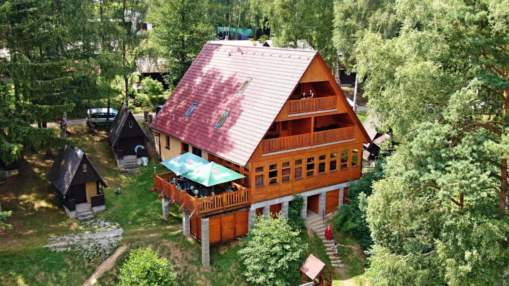 an overhead view of a house with a red roof at Penzion Diana in Kunžak